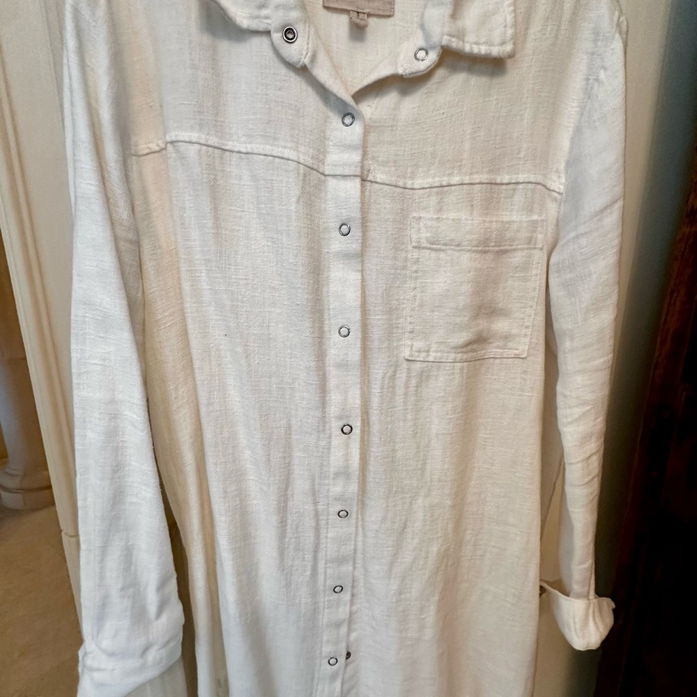 Moon River Cream linen dress with fringe hem.